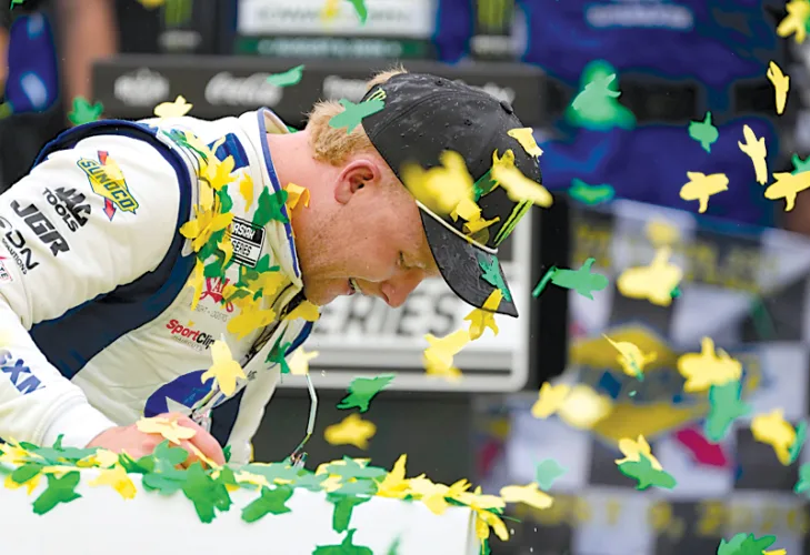 Gibbs holds on to win race at Iowa Speedway